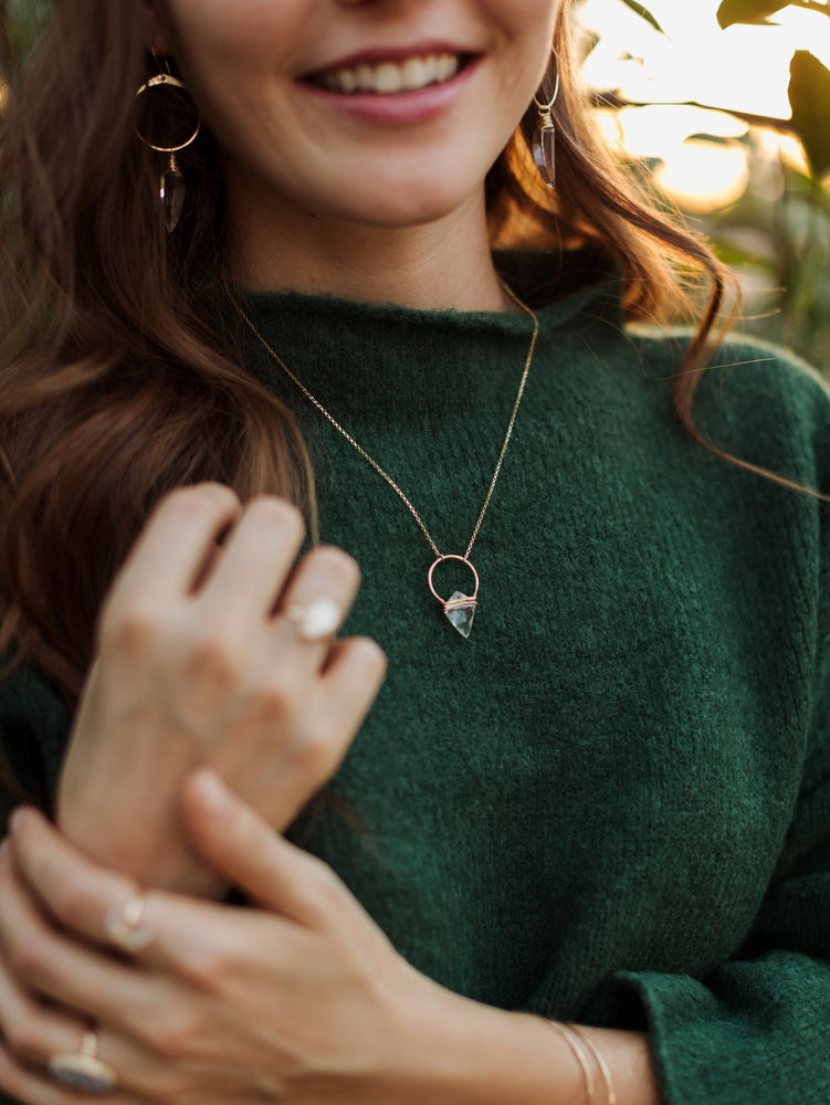 Crystal Quartz arrowhead gemstone  and gold hoop pendant. Wire wrapped jewelry
